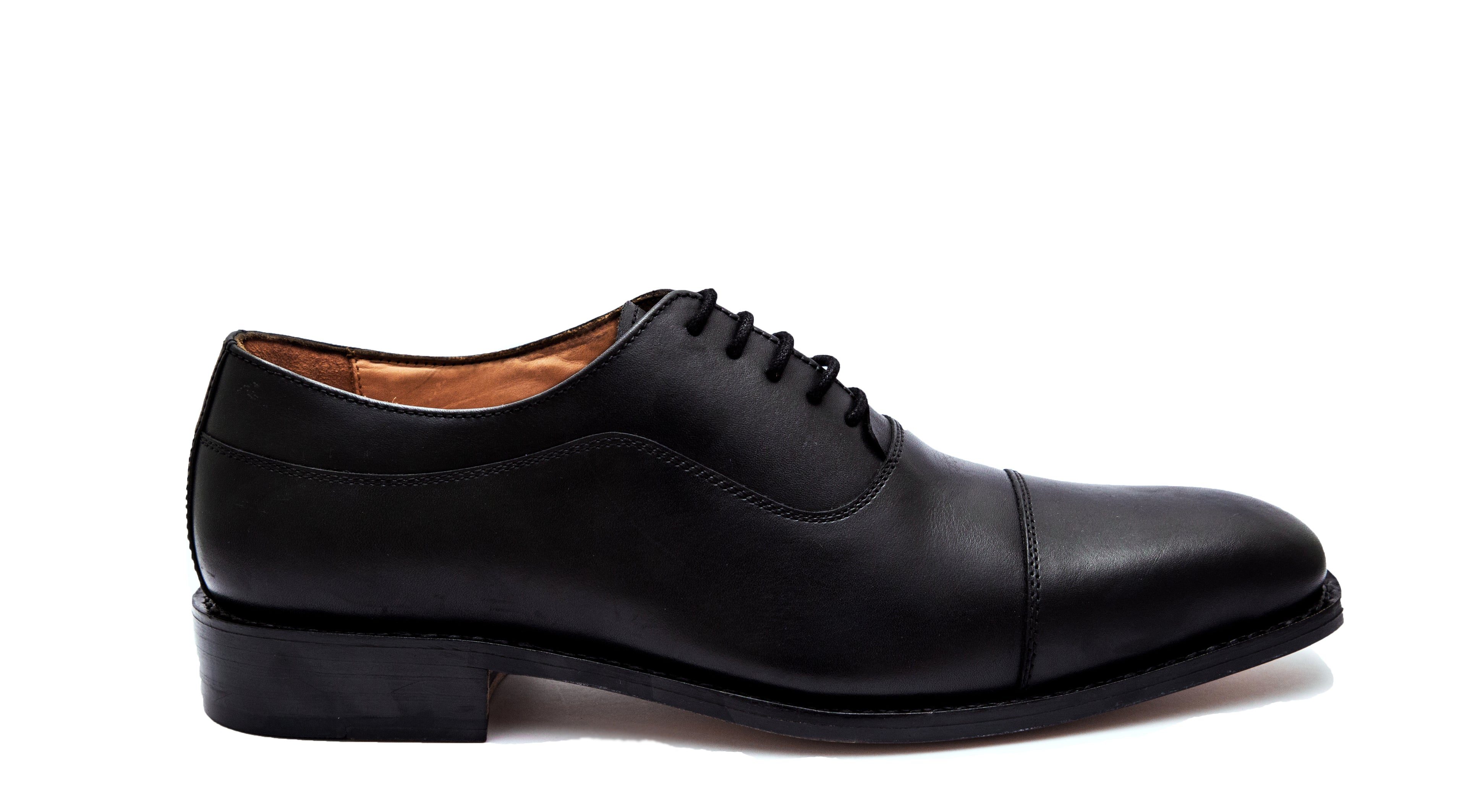 Black leather dress shoe on a white background